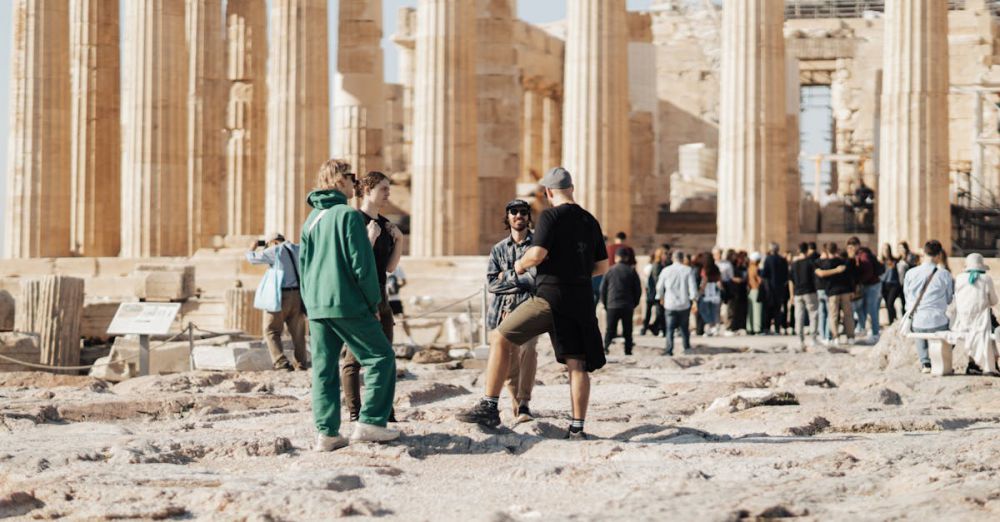 Group Visits - A group of tourists exploring the ancient ruins of the Parthenon in Athens, Greece.