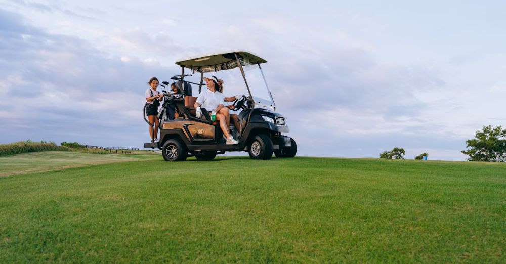 Golf Courses - A family riding a golf cart on a sunny day at the golf course, enjoying outdoor recreation.