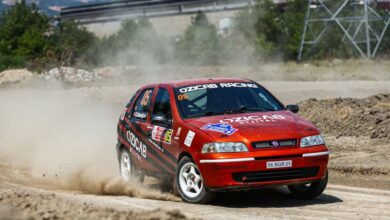 Challenging Courses - A Fiat Palio fiercely competes in a dusty rallycross event, capturing the thrill of motorsport.