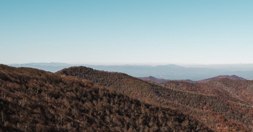 Popular Destinations - Beautiful view of the Blue Ridge Mountains in North Carolina during autumn with clear skies.