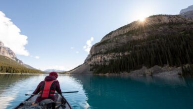 Solo Kayaking - A serene kayaking journey on a crystal lake in Banff National Park, Canada.