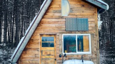 Solo Snowshoeing - A picturesque wooden cabin amid snow-covered trees in Québec, Canada capturing winter's tranquility.