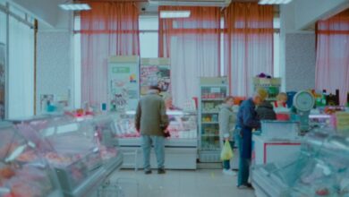 Refrigerators - Interior of a small local shop in Moscow with customers browsing and purchasing items.