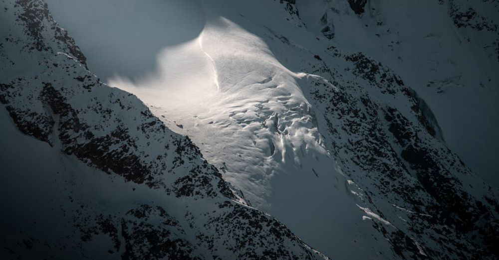 Eco-Tourism Tours - A breathtaking view of snow-covered mountains in Tirol, Austria during winter.