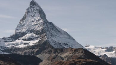 Climbing Photography - Majestic Matterhorn mountain peak in Zermatt, Switzerland, under a clear blue sky.