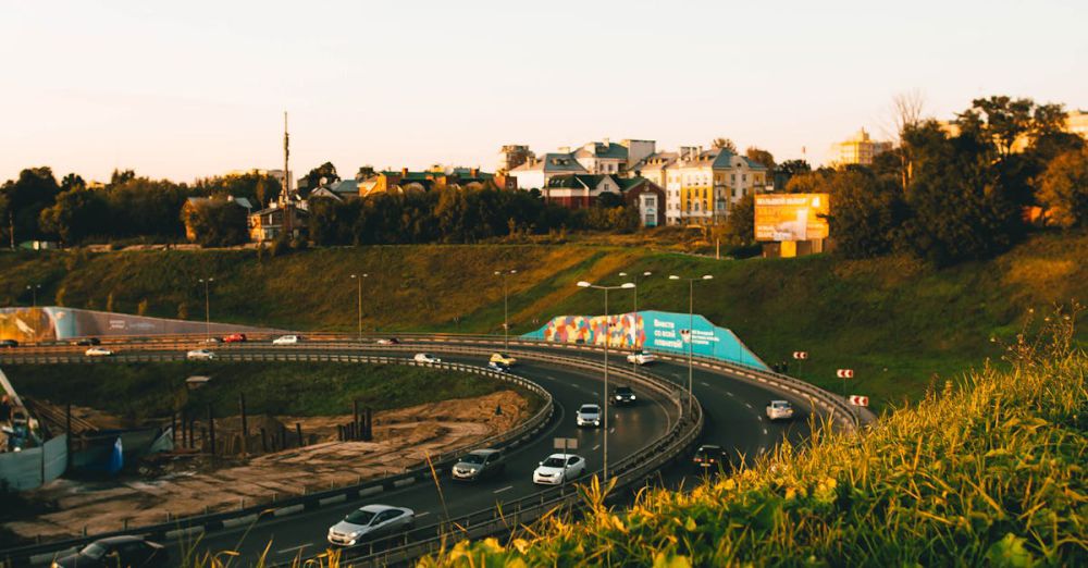 Popular Routes - A picturesque summer roadway with cars driving in Nizhny Novgorod, Russia.