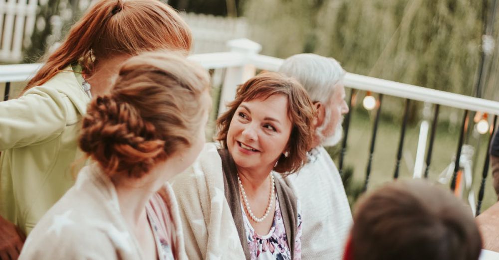 Picnic Gardens - Family enjoying a cozy outdoor summer gathering with smiles and conversations.