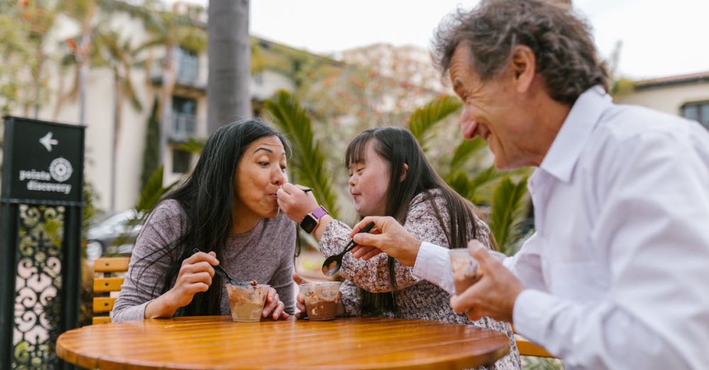 Family Museums - A joyful family sharing ice cream at an outdoor table, embracing quality time and togetherness.