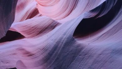 National Park Road Trips - Beautiful sandstone layers with vibrant colors in Antelope Canyon, Page, AZ.