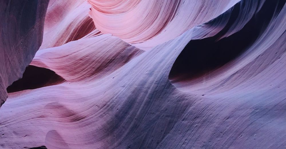 National Park Road Trips - Beautiful sandstone layers with vibrant colors in Antelope Canyon, Page, AZ.