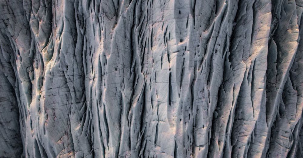 Nature Photography - A detailed aerial view of a rugged rock surface with natural erosion patterns in Iceland.