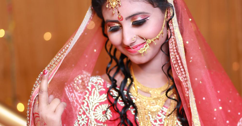 Cultural Festivals - Beautiful Indian bride in traditional red saree and gold jewelry, exuding grace and elegance.