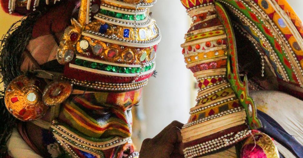 Dance Music Festivals - Colorful Kathakali performers in Kerala, India showcasing intricate costumes and makeup.