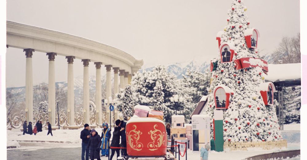 City Festivals - Snow-covered Christmas scene featuring a festive tree and colonnades in winter.