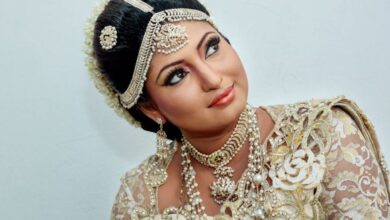 Fashion Festivals - A stunning portrait of a South Asian bride in luxurious traditional attire adorned with intricate jewelry and floral lace.