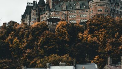 Quebec Zip Lining - Stunning autumn view of Château Frontenac in Quebec City, showcasing historic architecture.