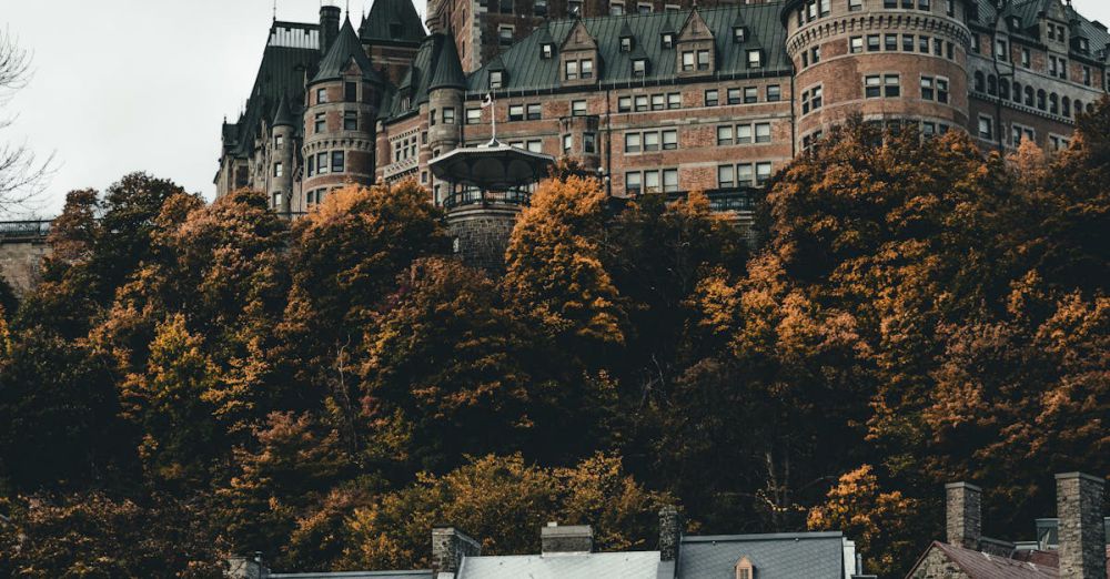 Quebec Zip Lining - Stunning autumn view of Château Frontenac in Quebec City, showcasing historic architecture.