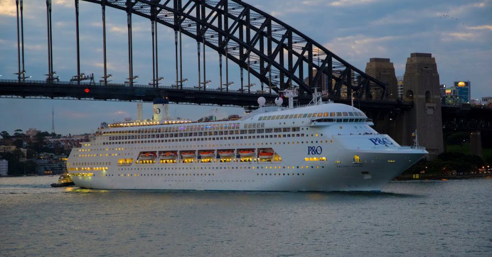 Zip Lining Tour Choice - Elegant cruise ship navigates under Sydney's iconic Harbour Bridge at twilight.