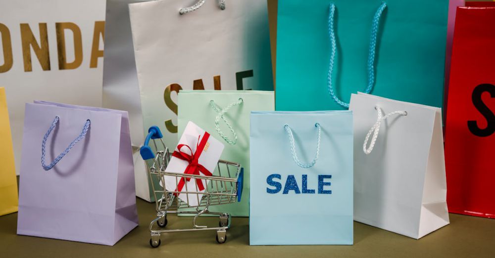 Affordable Gifts - A mix of colorful shopping bags and a small cart displaying a discount gift.