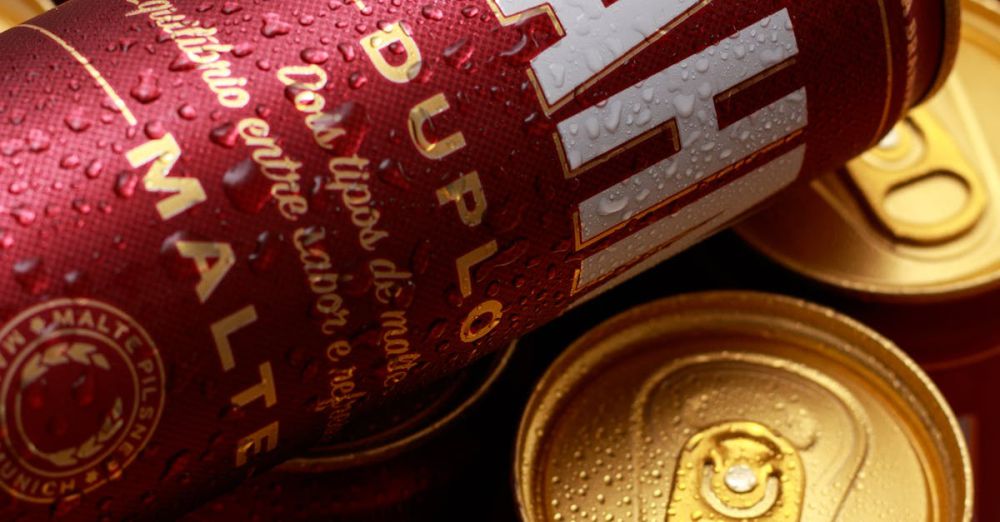 Popular Vineyard & Brewery Tours - Close-up of Brahma Duplo Malte beer cans with dew, captured in Recife, Brazil.