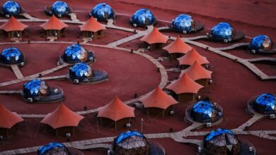 Luxury Tours - Explore a unique luxury glamping site with futuristic tents in the desert, offering an exotic travel experience.