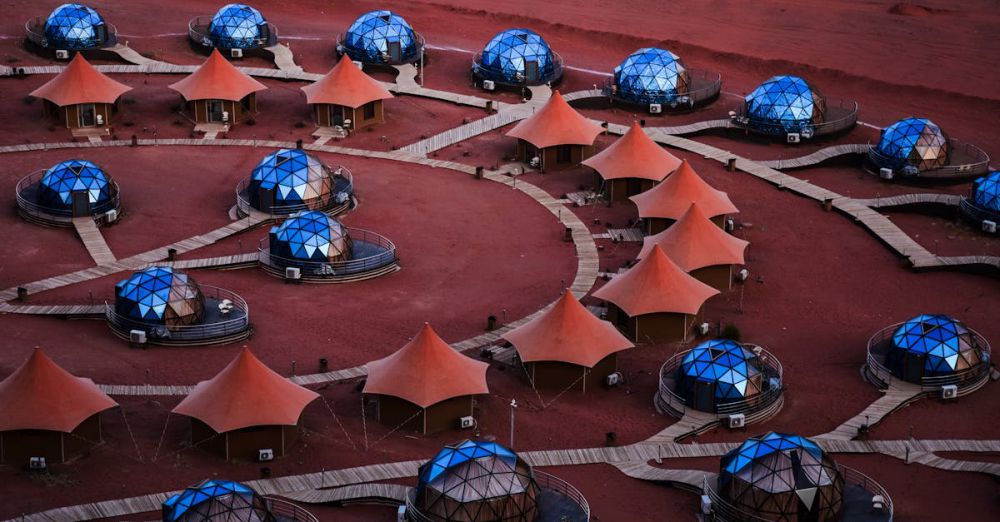 Luxury Tours - Explore a unique luxury glamping site with futuristic tents in the desert, offering an exotic travel experience.