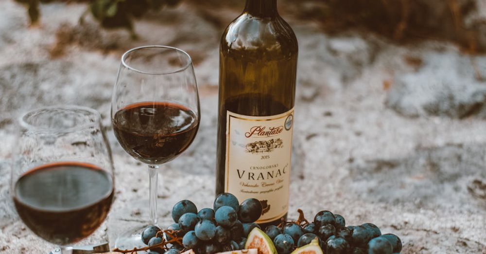 Wine & Food Pairing - A rustic outdoor wine and cheese platter with grapes and figs, perfect for a cozy picnic.