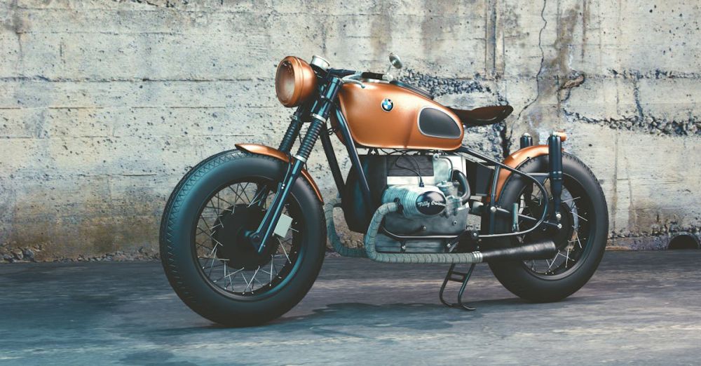 Custom Tours - A classic cafe racer motorcycle parked against an industrial backdrop, showcasing its vintage style.