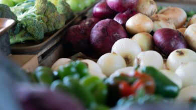 Farmers Markets - A colorful array of fresh vegetables displayed at an outdoor market.