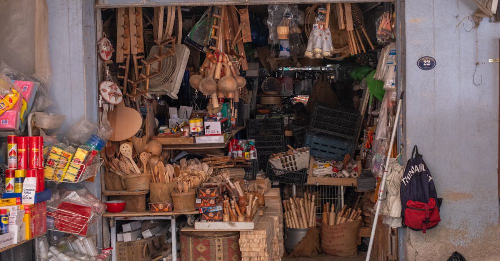 Handmade Goods Markets - A cluttered shop in İzmir's bazaar, showcasing various wooden utensils and goods.