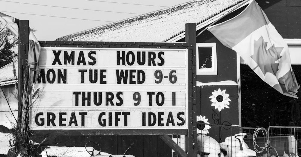 Ontario Farmers Markets - Black and white winter scene at a Canadian countryside Christmas shop with sign and flag.