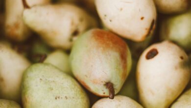 Gluten-Free Markets - Close-up of fresh organic pears showcasing their vibrant colors and textures, ideal for promoting healthy eating.