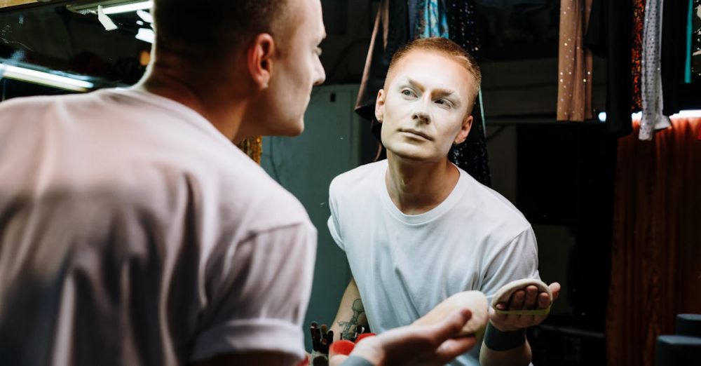 Makeup - Portrait of a drag artist in a dressing room applying makeup, embodying transformation and self-expression.