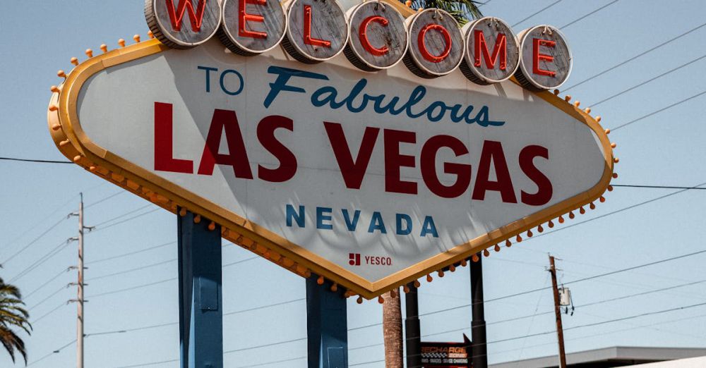 National Park Portaging - Modern colorful signboard with inscription welcome to fabulous Las Vegas Nevada state in USA placed on green lawn on sunny day