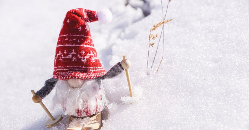 Skiing Winter Festivals - Adorable gnome figurine skiing through fresh snow, capturing the essence of winter fun.