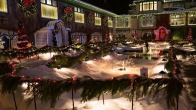 BC Winter Festivals - Decorated mansion with festive Christmas lights in winter, Brentwood Bay.