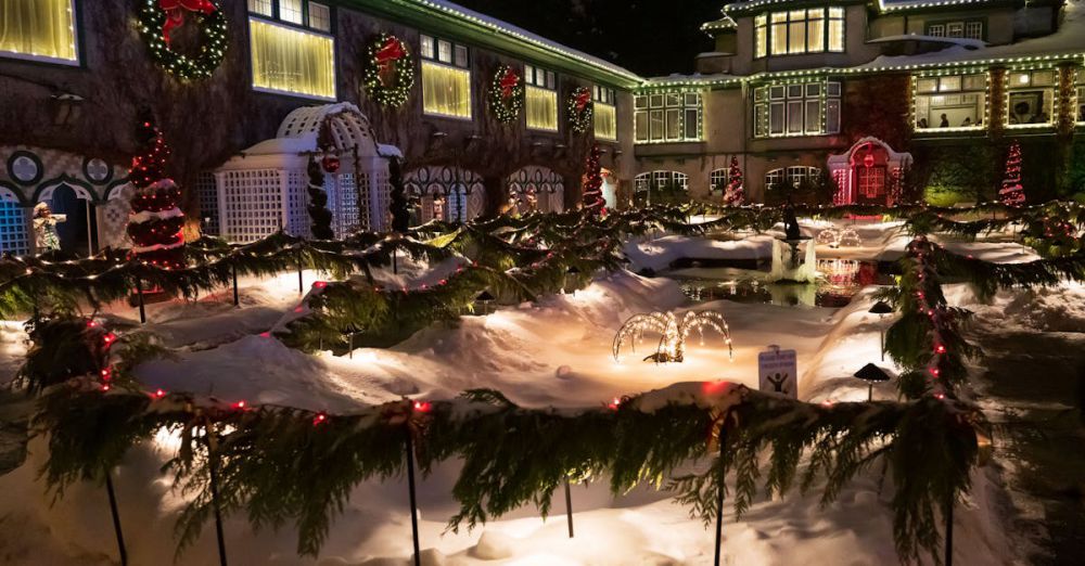 BC Winter Festivals - Decorated mansion with festive Christmas lights in winter, Brentwood Bay.