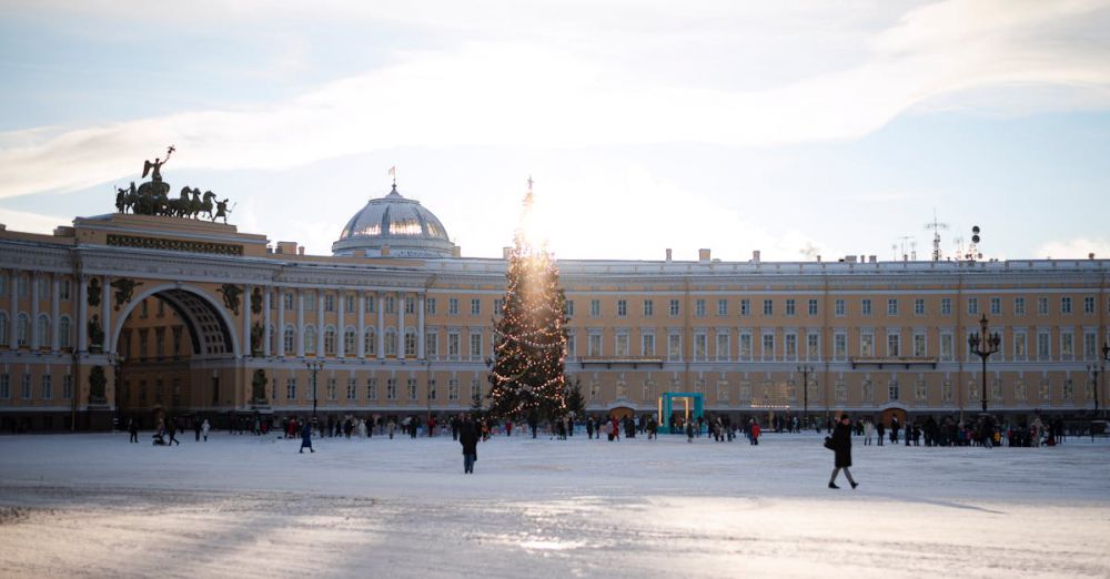 Cultural Winter Festivals - Winter holiday atmosphere at Palace Square with a decorated Christmas tree and historic architecture.