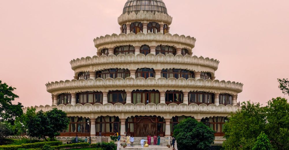 Popular Urban Gardens - A stunning Indian monument surrounded by greenery and visitors in a park setting.