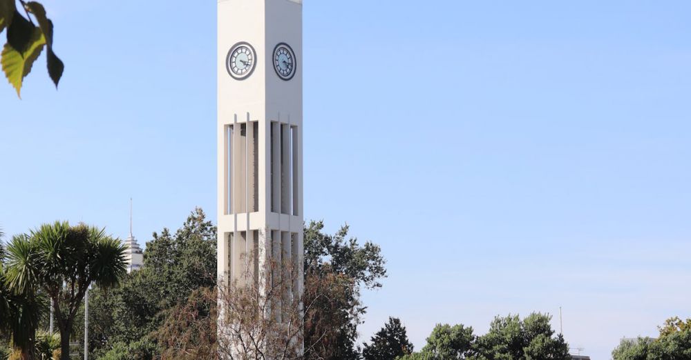 Educational Urban Gardens - Iconic Clock Tower in Palmerston North, New Zealand, surrounded by gardens and park.