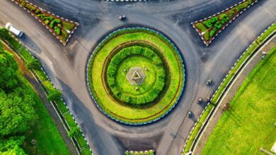 Landscape Design Gardens - Vibrant aerial photo of a green roundabout in Jawa Barat, Indonesia, highlighting urban landscaping.