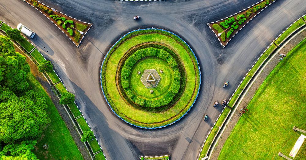 Landscape Design Gardens - Vibrant aerial photo of a green roundabout in Jawa Barat, Indonesia, highlighting urban landscaping.