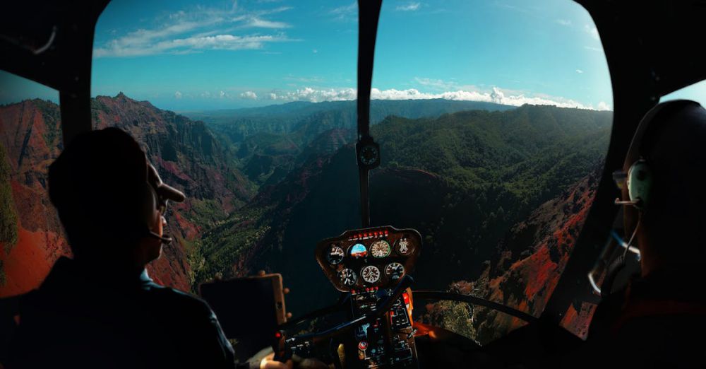 Experience - Experience breathtaking aerial views from a helicopter over Kauai's lush valleys and mountains.