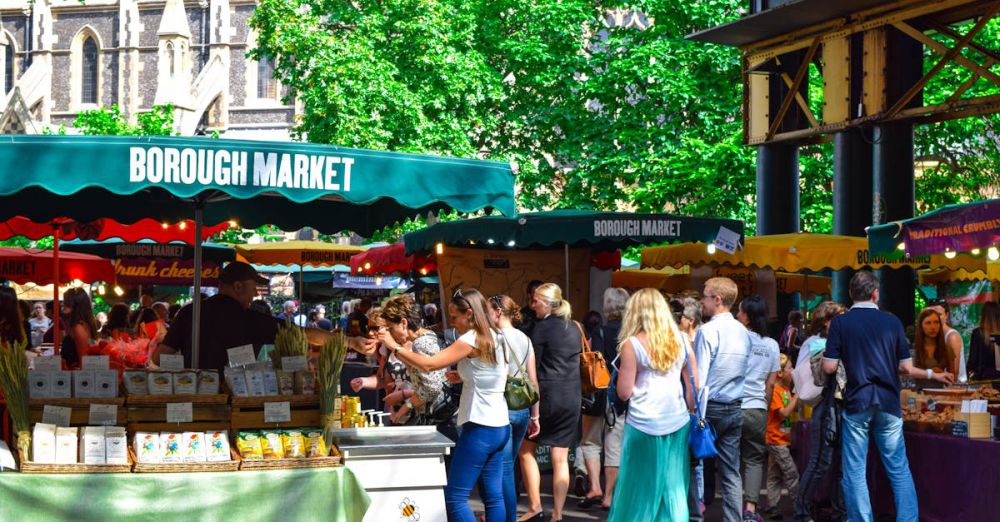 Markets - Lively scene at Borough Market in London, filled with people shopping and enjoying the atmosphere.