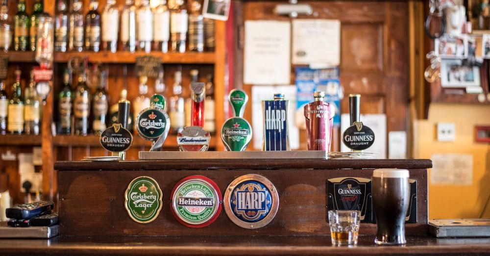 Brands - A warm, inviting pub with various beer brands on tap, perfect for social gatherings.