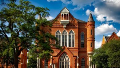 Schools - Captivating view of Clark Hall at the University of Alabama with its iconic brick facade.