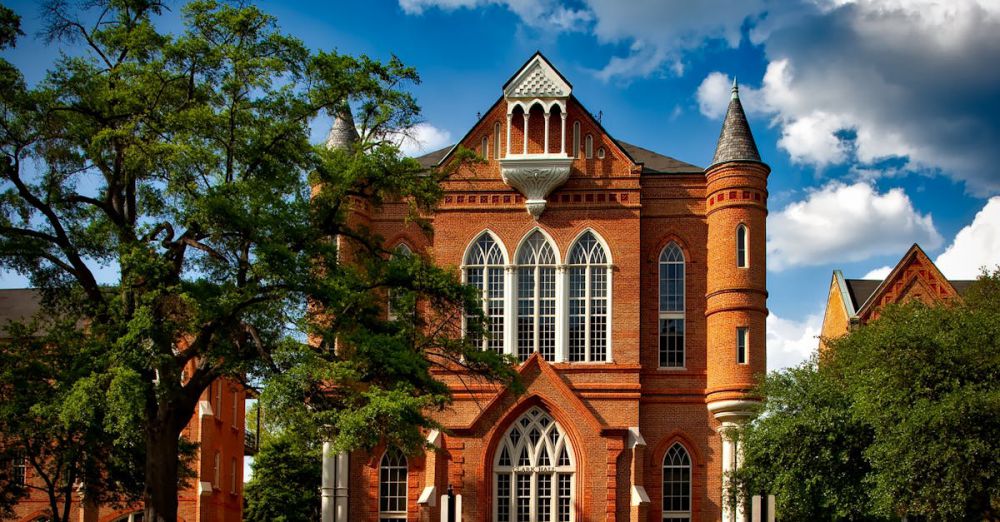 Schools - Captivating view of Clark Hall at the University of Alabama with its iconic brick facade.