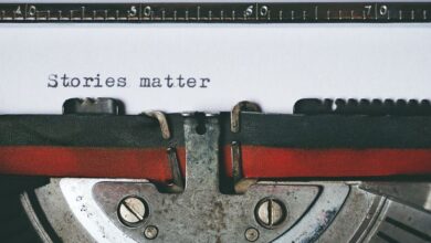 Stories - Close-up of a vintage typewriter with the text 'Stories matter' typed on paper, evoking nostalgia.