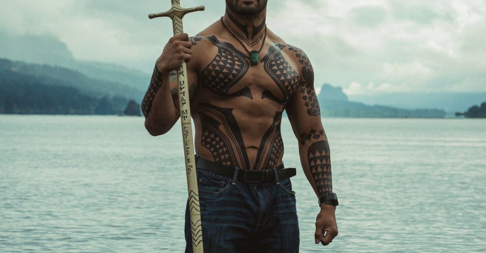 Legends - A man dressed as an aquatic superhero poses confidently in water holding a trident, embodying strength and myth.