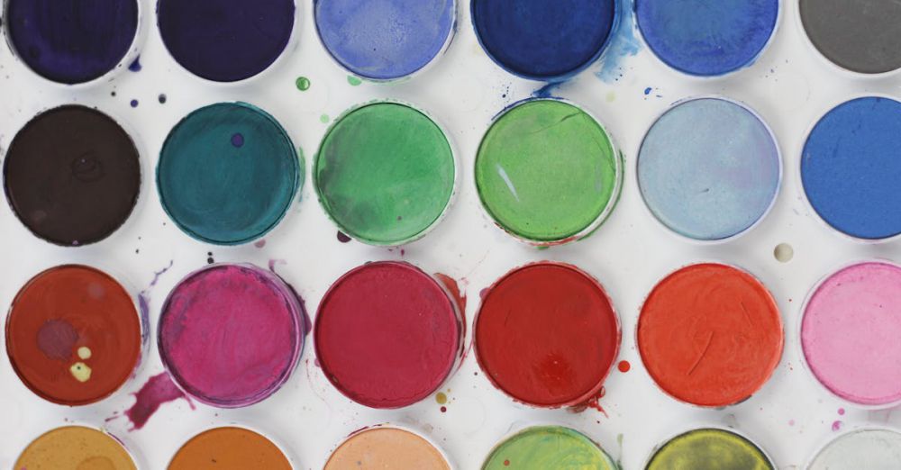 Art Supplies - A colorful close-up of vibrant watercolor paint palette ideal for art projects.